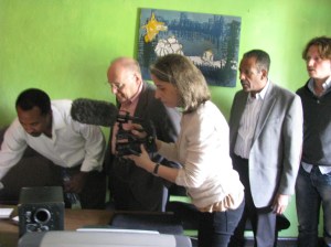 documentarian Jennifer Dworkin captures Paolos Regassa's work as Stephen Greenwald and Dhaba Wayessa look on